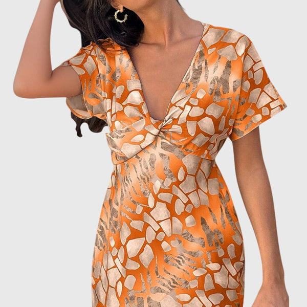 שמלות עם הדפס אבסטרקטי וחשיפת צוואר V