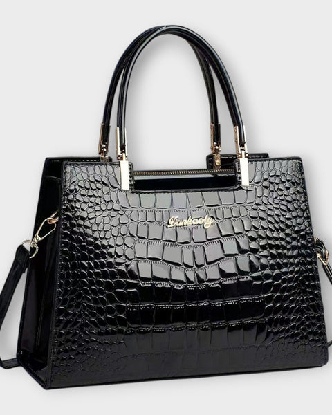 תיק יד מבריק בדוגמת עור תנין של לורה