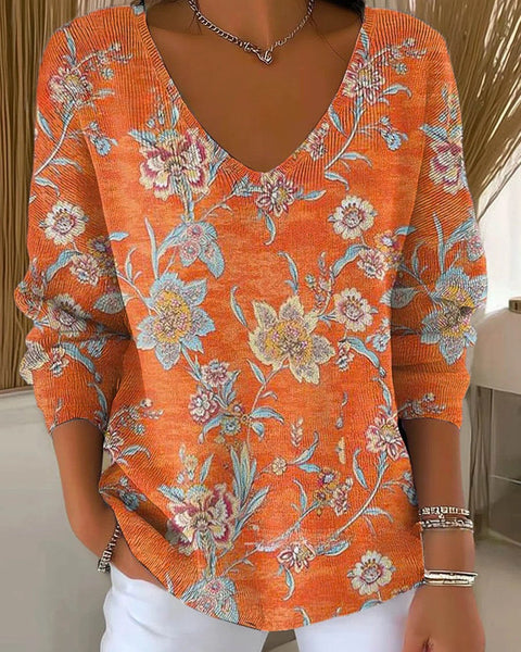 אדל – סוודר עם צווארון V