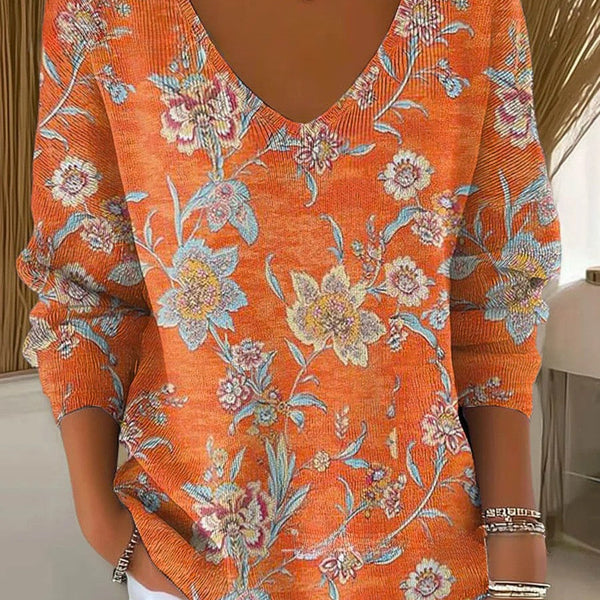 אדל – סוודר עם צווארון V