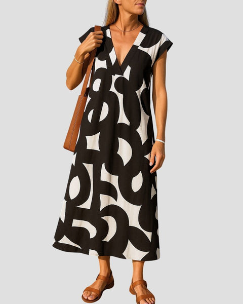 סילבינה – שמלת מקסי זורמת עם צווארון וי אלגנטי