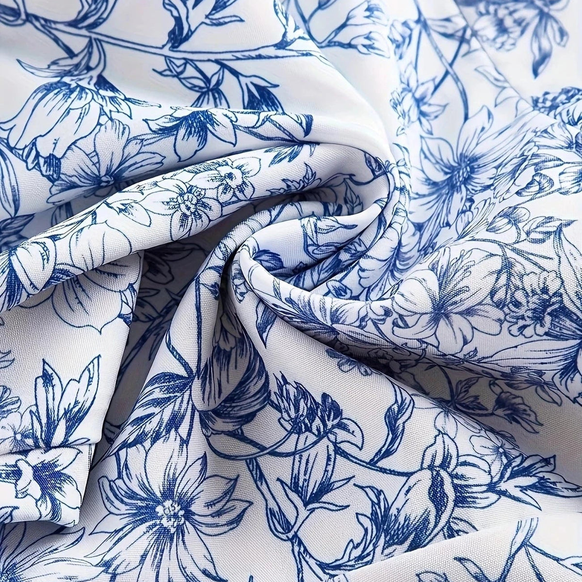 Ortagus - שמלה פרחונית עם רפלים