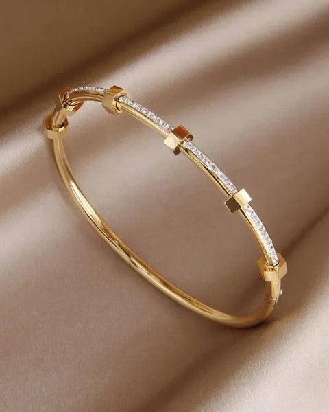 צמיד זהב אלגנטי עם אבנים מרהיבות