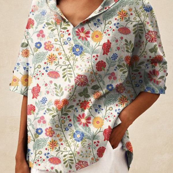 אנדראה | טופ אלגנטי עם צווארון V