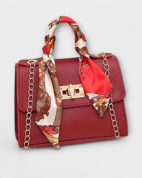 תיק יד עור חום אלגנטי עם סגירת זהב