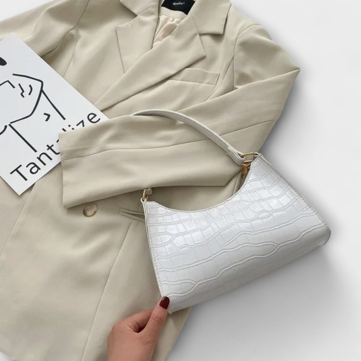 תיק עור מבריק הלורה - סגנון ופונקציונליות מושלמת