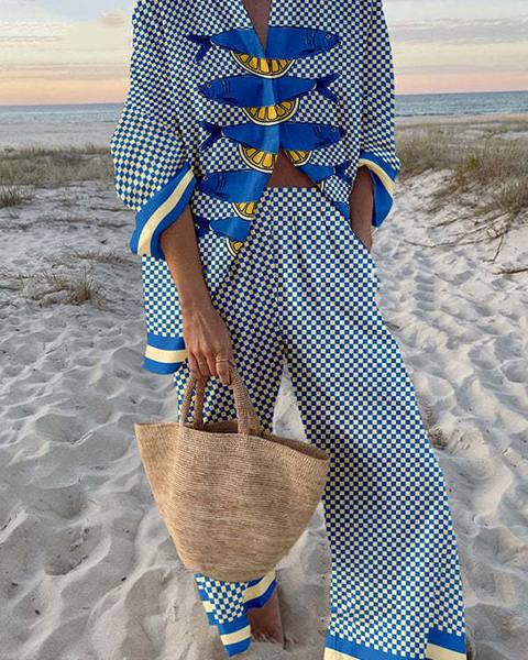 טריוולה™ | סט מצעים עם הדפס סרדינים ולימון