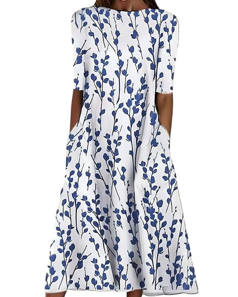 האריטה | שמלת קיץ מידי עם פרחים חופיים ו קו צוואר עגול