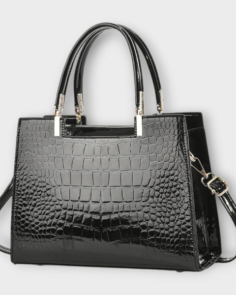 תיק יד מבריק בדוגמת עור תנין של לורה