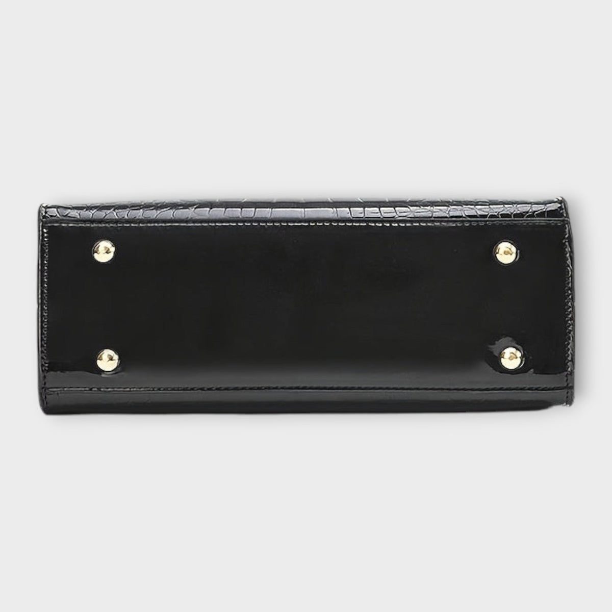 תיק יד מבריק בדוגמת עור תנין של לורה