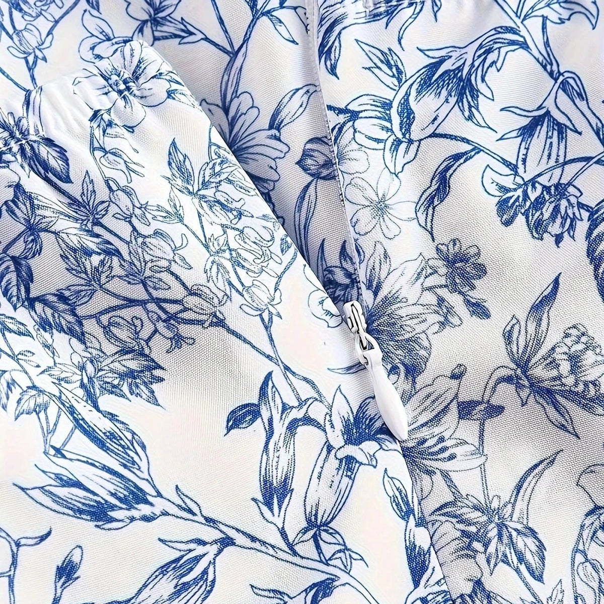 Ortagus - שמלה פרחונית עם רפלים