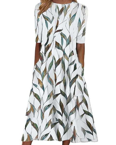 האריטה | שמלת קיץ מידי עם פרחים חופיים ו קו צוואר עגול